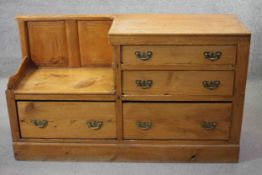 A 19th century pine chest of drawers fitted with box seat. H.86 W.146 D.46 cm.