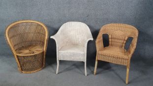 Two wicker conservatory chairs along with a vintage loom armchair.
