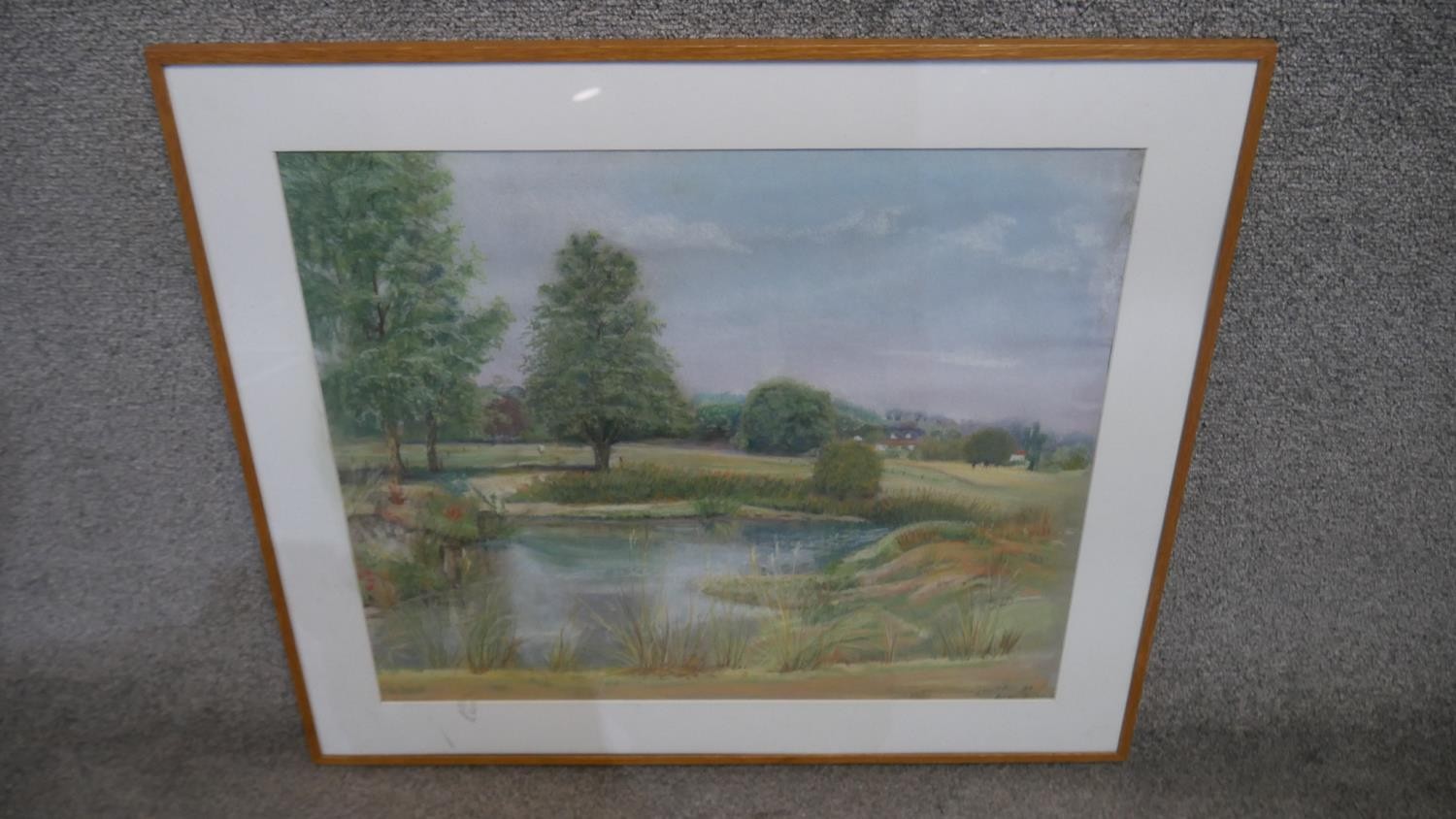 A framed and glazed pastel, parkland scene with lake, indistinctly signed. H.63 W.71cm - Image 2 of 5