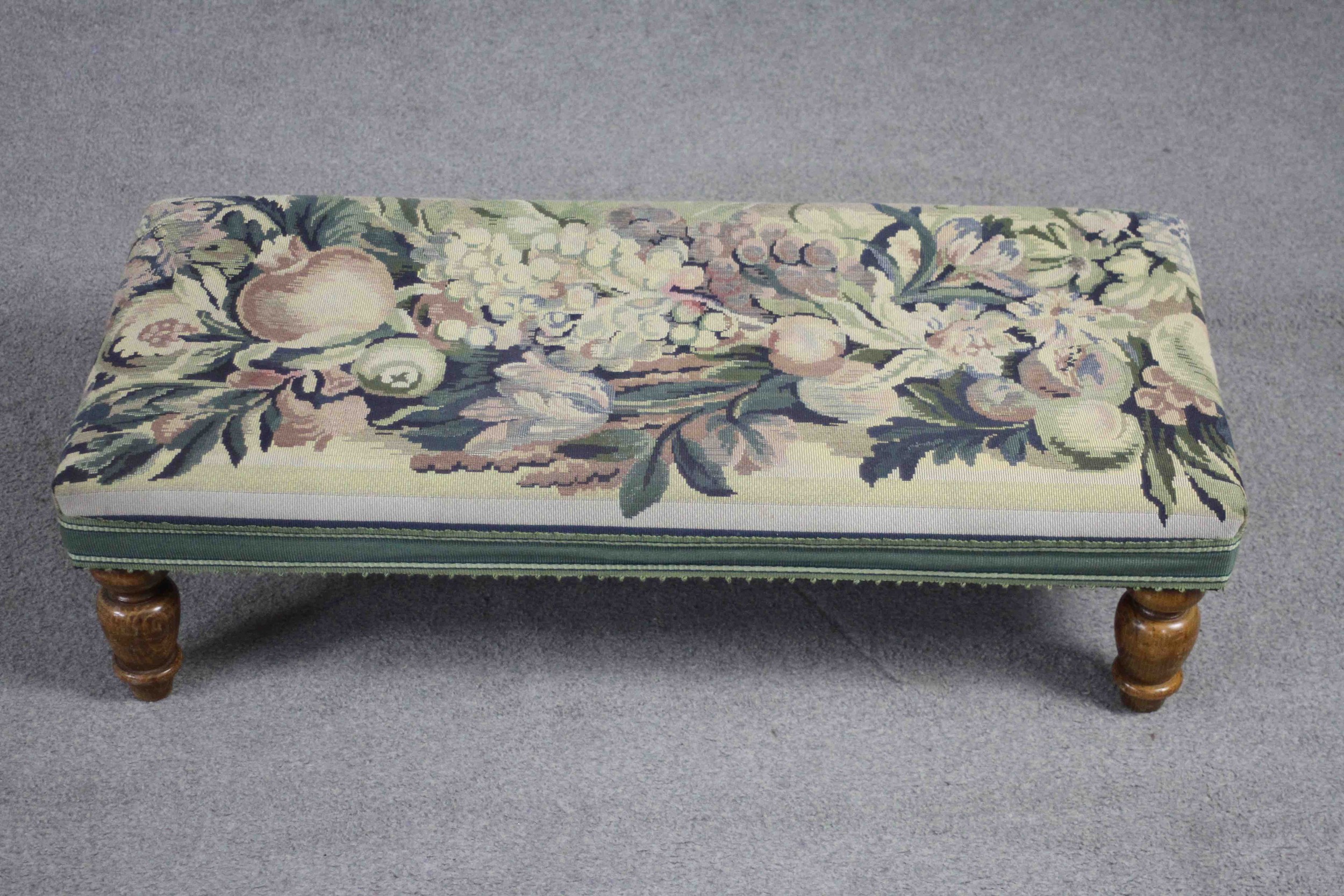 A Victorian style foot stool in tapestry upholstery on beech baluster turned supports. H.24 W.80. - Image 2 of 5