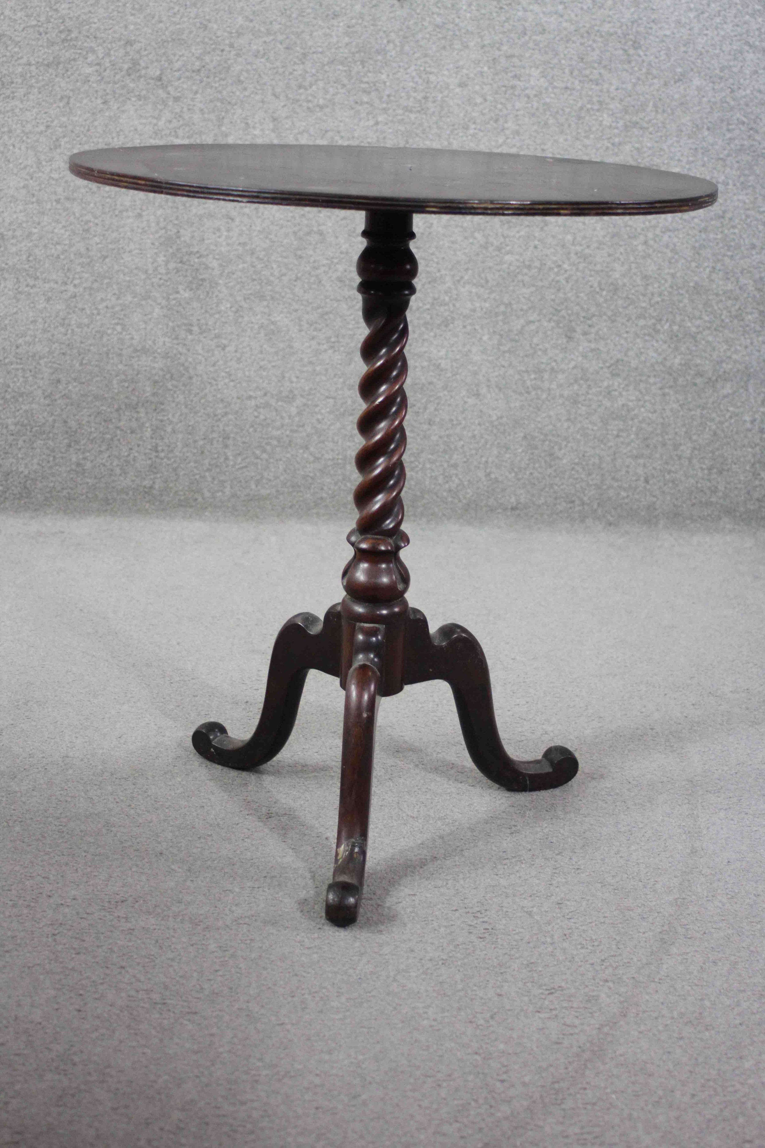 A 19th century mahogany occasional table on spiral twist cabriole supports. H.70 Diam. 62 cm - Image 2 of 5