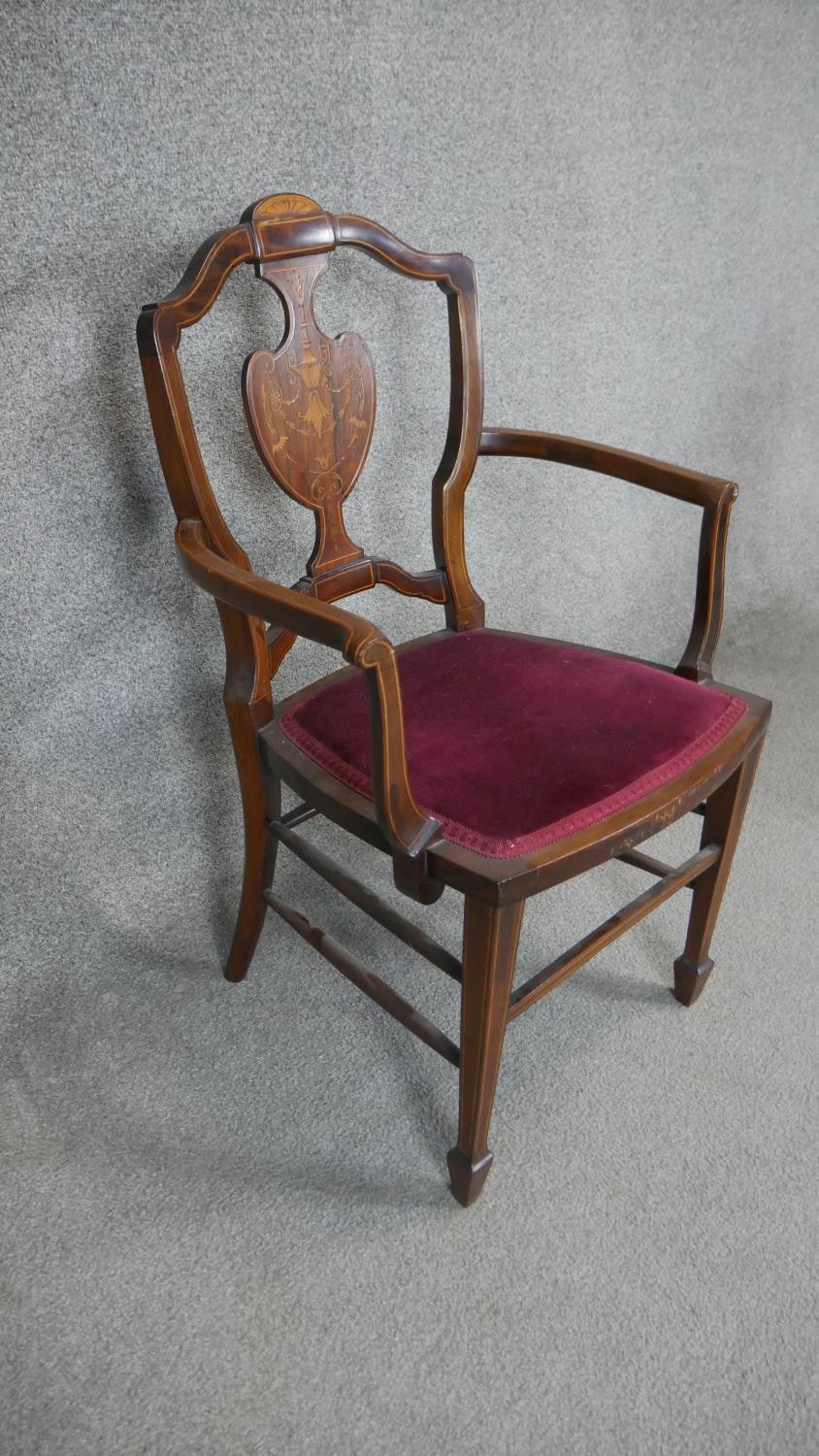 A pair of late 19th century rosewood armchairs with satinwood swag and urn inlay on square - Image 3 of 4