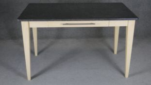 A contemporary marble topped kitchen dining table with frieze drawer on painted base. H.70 W.121 D.