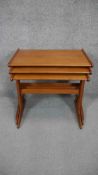 A nest of three mid century vintage teak graduating occasional tables. H.52 W.58 D.37cm