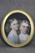 A gilt framed 19th century pastel portrait of two sisters. Unsigned. H.64 W.54cm