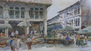 Tong Chin Sye (1939- ) A framed and glazed watercolour of an Singaporean market scene. Signed Tong