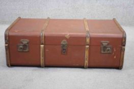 A vintage beech and metal bound travelling trunk.