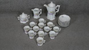 A transfer printed twelve person porcelain Lilac and Lily of the valley design coffee set. (28
