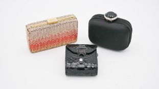 An Anya Hindmarsh diamante coral gradient clutch bag, a black leather La Perla clutch bag and a