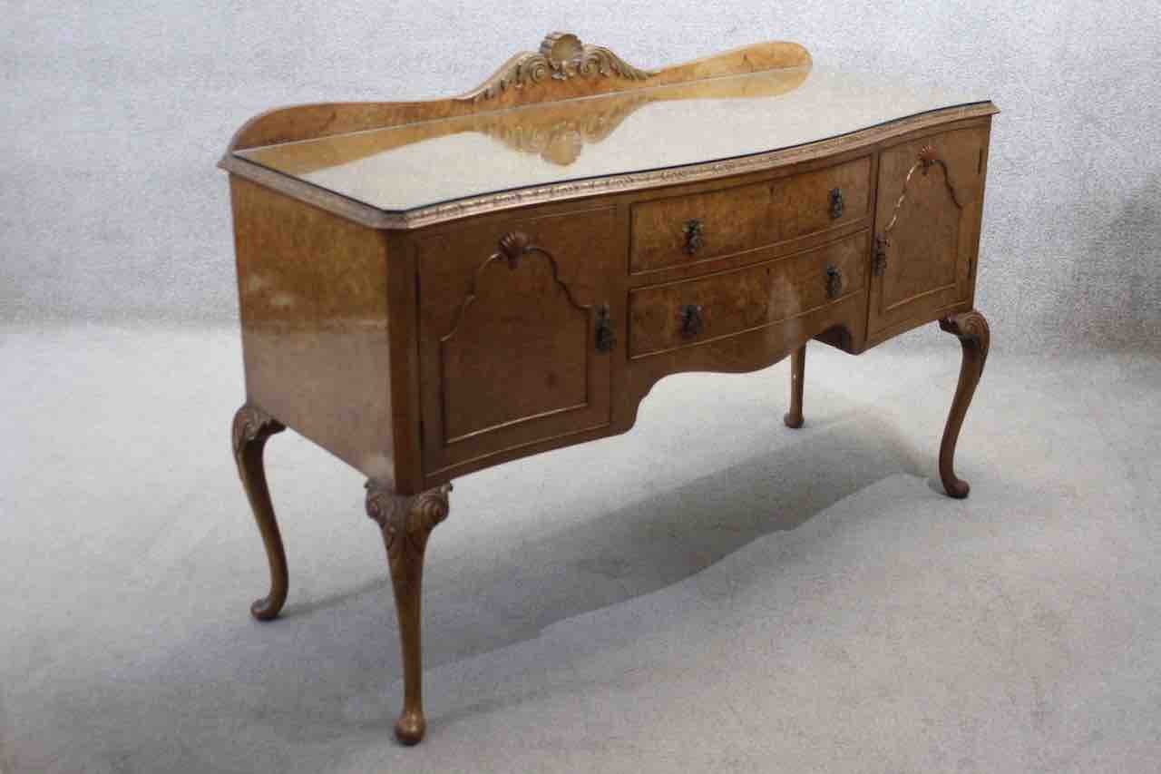 A mid century burr walnut Epstein sideboard with central drawers flanked by cupboards on carved - Image 7 of 8