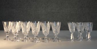 A collection of seventeen cut crystal sherry and port glasses. A set of six Waterford cut crystal
