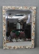 A large vintage seashell framed wall mirror with rope border. H.124 W.90cm