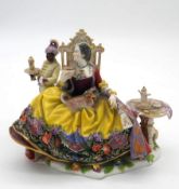 A hand painted 19th century Meissen porcelain figure group by J.J. Kaendler. Depicting a seated lady