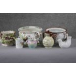 A collection of seven porcelain and ceramic pieces. Including a Torquay ware lidded jug, two