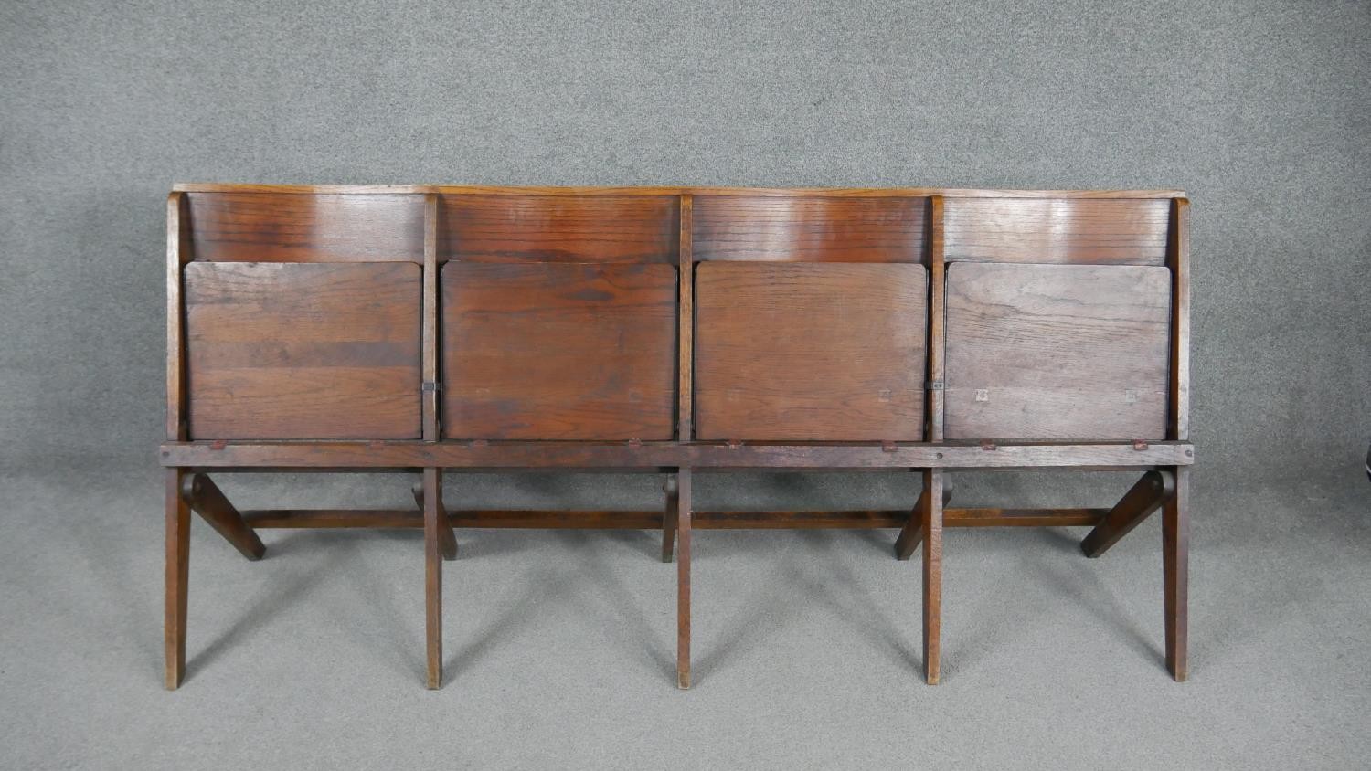 A set of four vintage oak folding church or cinema seats. H.80 W.187 D.67cm - Image 2 of 5