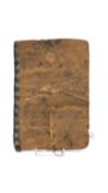 An ancient Islamic handwritten calligraphic manuscript with velum cover. H.19 W.13cm