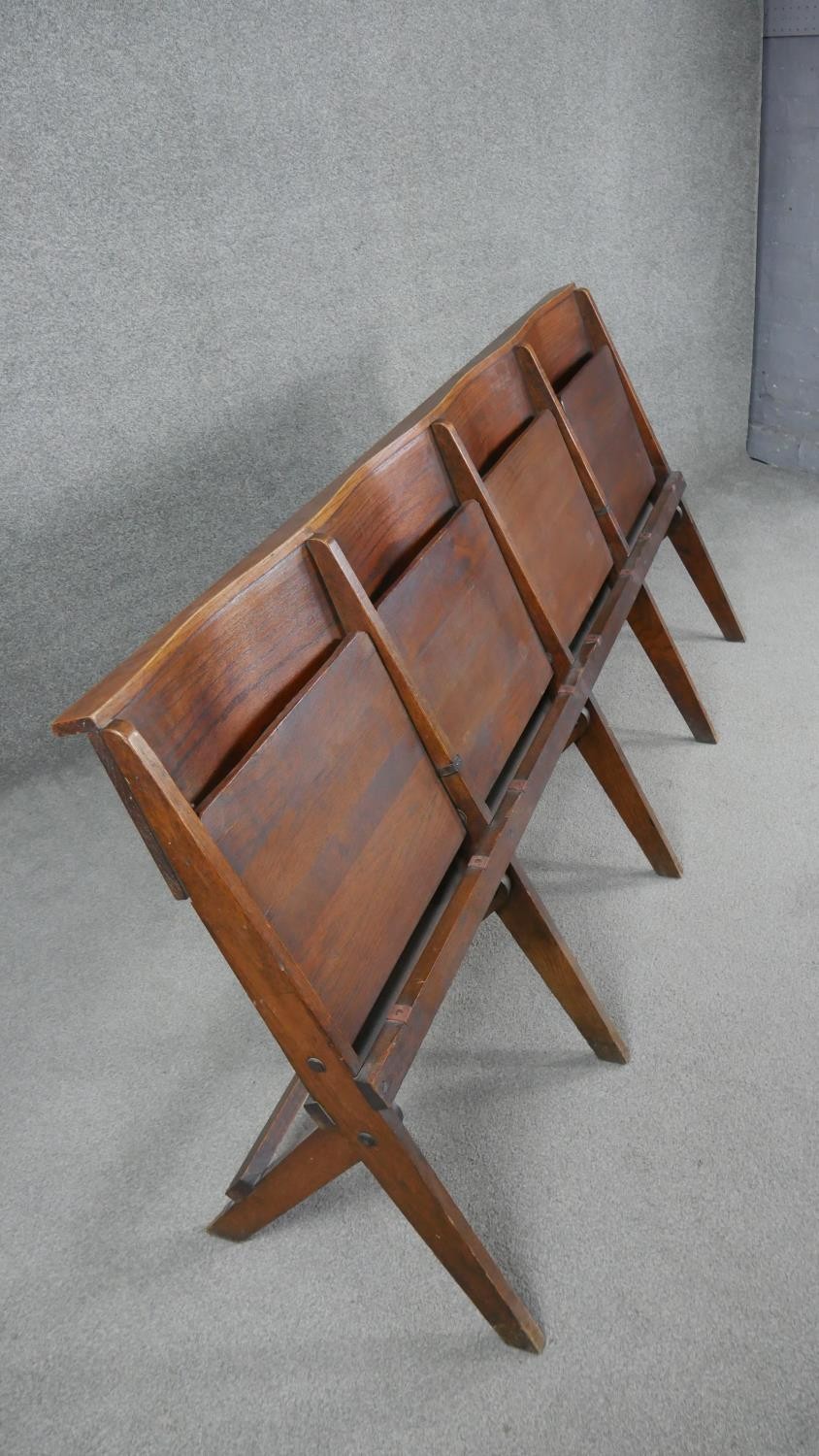 A set of four vintage oak folding church or cinema seats. H.80 W.187 D.67cm - Image 4 of 5