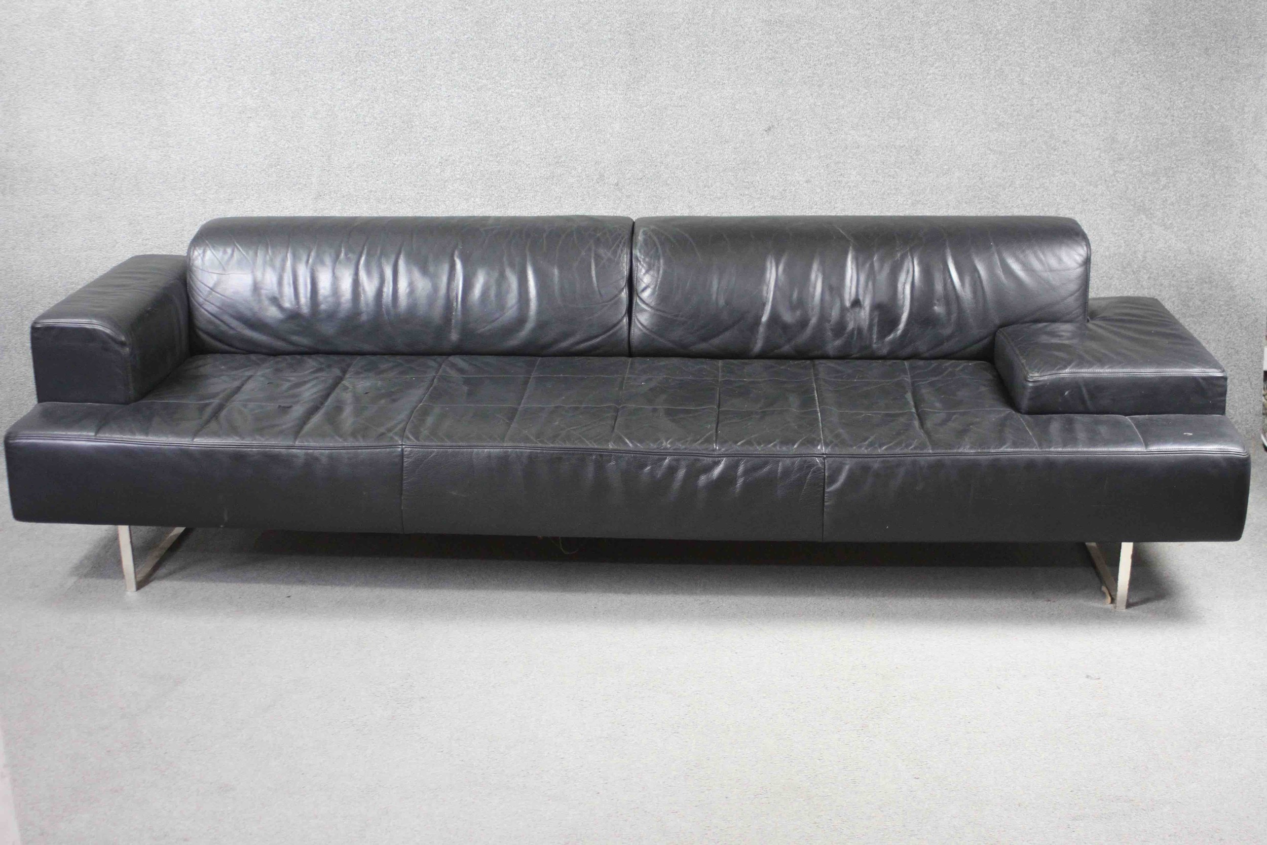 Poltrona Frau, Italy, Quadra sofa in hand stitched black leather. H.70 W.265 D.87