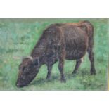 Otto P. Balle (1865 - 1916) A gilt framed oil on canvas of a cow in a field. Signed by artist, label
