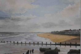 A framed and glazed watercolour of a beach scene. Signed Ken Perry. H.35 W.43cm