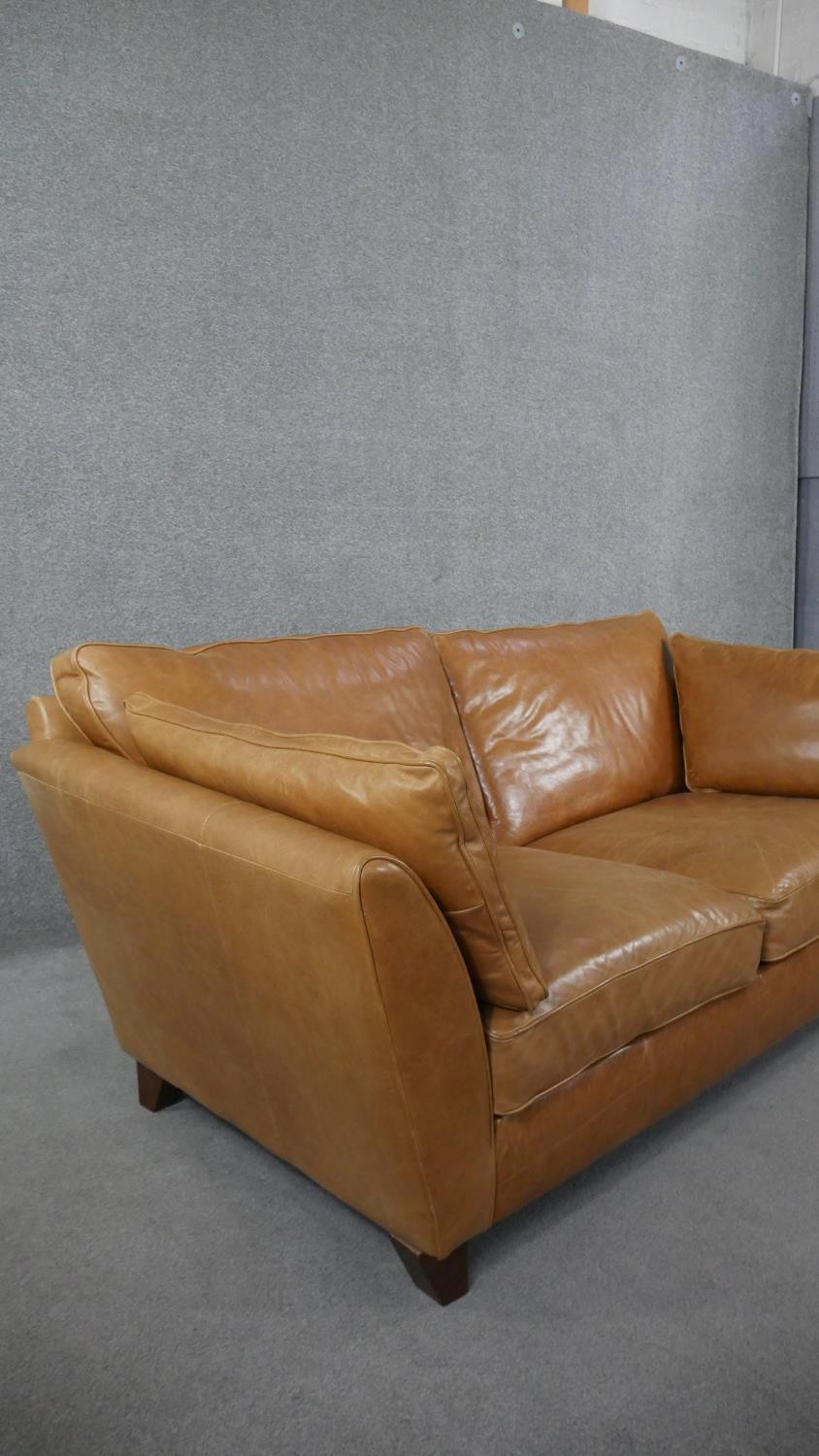 An Art Deco style two seater sofa in light tan leather upholstery. H.84 W.179 D.97cm - Image 4 of 5