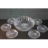 A Villeroy & Bosch large heavy crystal Lillian stylised shell bowl along with six matching dishes.