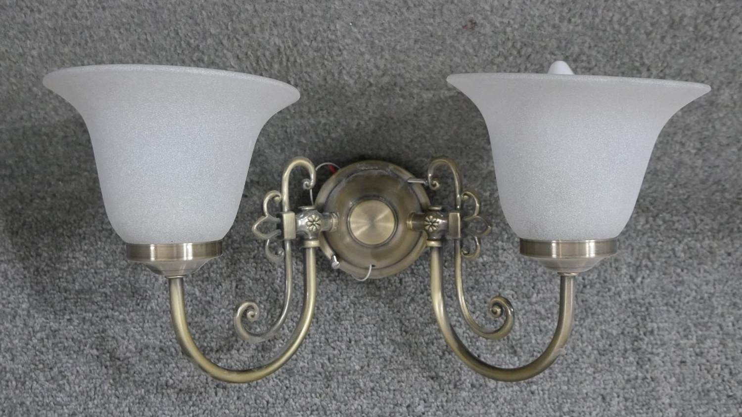 A pair of brushed brass and glass two branch wall lights. Each with two bell shaped frosted milk - Image 2 of 3