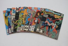 Twelve vintage DC comics. Including The Phantom Stranger, Justice League America, Scalphunter and