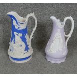 Two 19th century Jasperware ceramic Samuel Alcock jugs. One lavender parian with Naomi & her