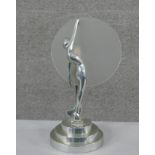 A Sarsaparilla vintage Art Deco style chrome nude female lamp with frosted glass disc. Impressed