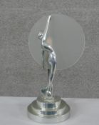 A Sarsaparilla vintage Art Deco style chrome nude female lamp with frosted glass disc. Impressed