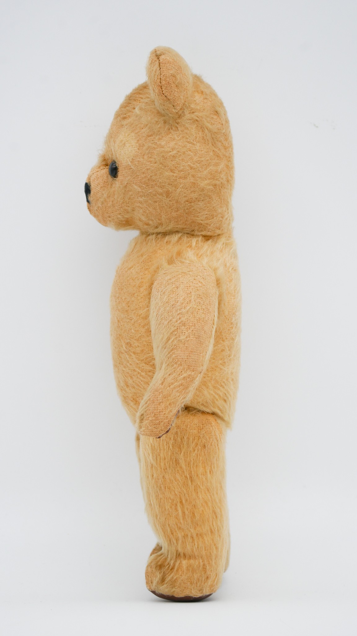 An antique yellow growler teddy bear with glass eyes and leather pads. - Image 4 of 5