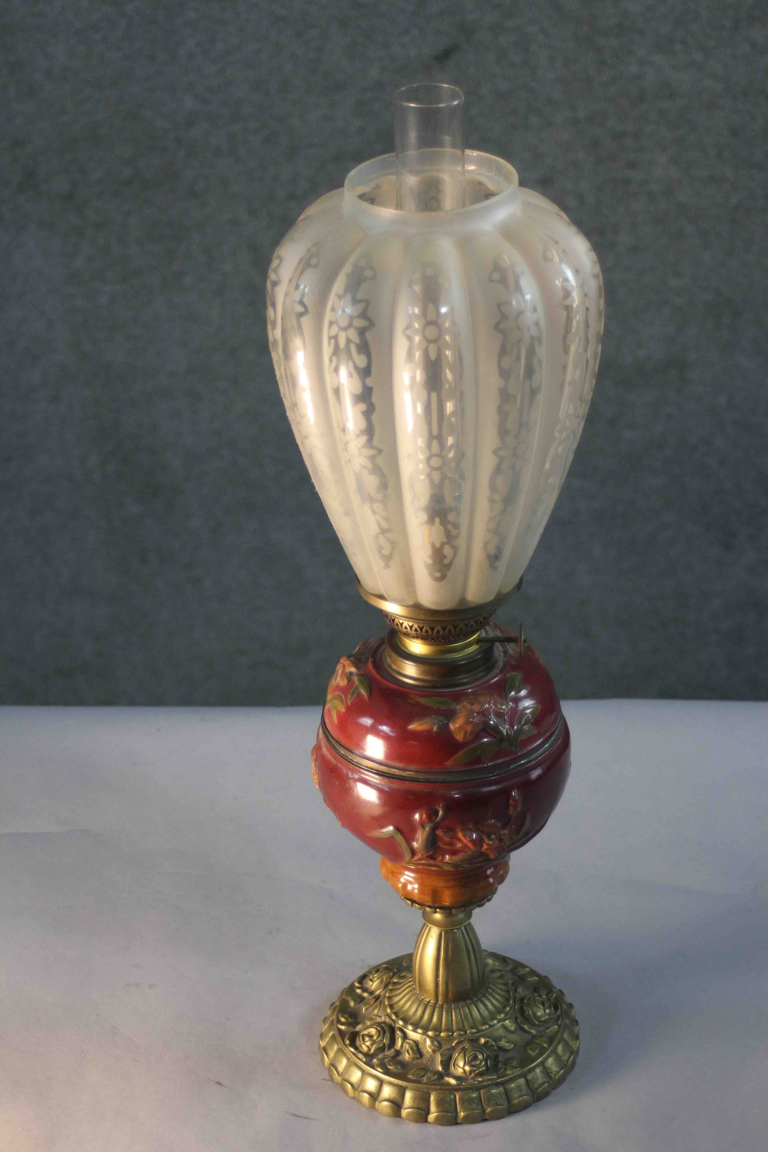 A Victorian relief ceramic and repousse brass rose design oil lamp. With etched tear drop shaped - Image 2 of 6