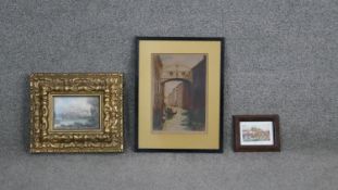 Three framed and glazed prints. One etching of a Venetian canal scene, a gilt framed print of