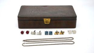 A chrome and brown leather mens grooming kit along with five pairs of vintage cufflinks and two