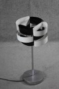 A vintage black and white metal strip abstract design table lamp on brushed chrome stand. H.60 W.