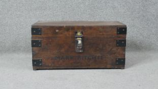 A C.1900 iron bound travelling trunk with twin carrying handles. H.25 W.49 D.28cm