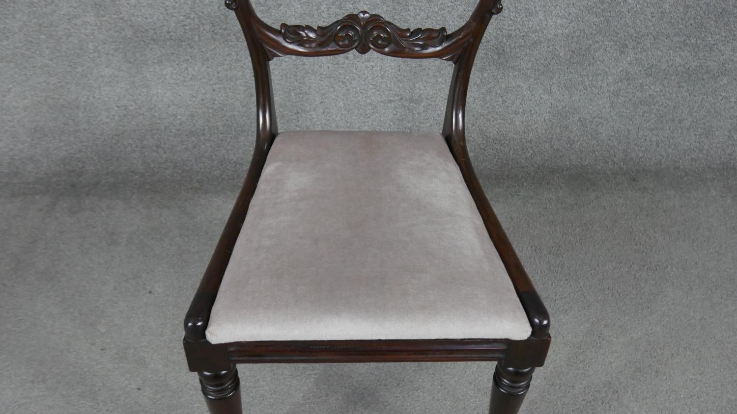 A set of six Victorian acanthus carved mahogany shaped back dining chairs on turned tapering - Image 6 of 7