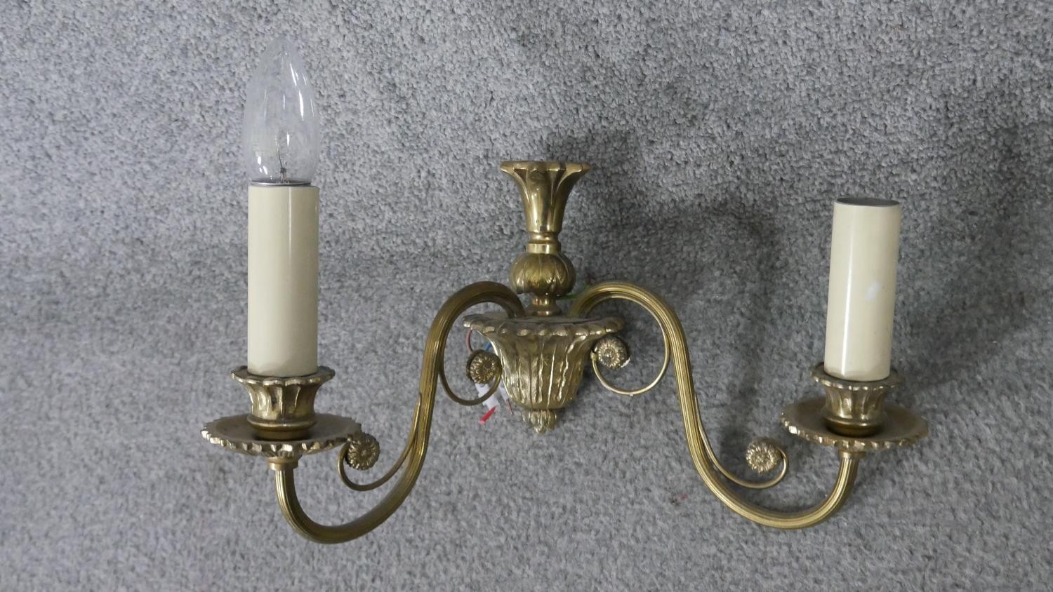 A pair of vintage brass acanthus and scrolling floral design two branch wall lights. H.30 W.34cm - Image 2 of 4