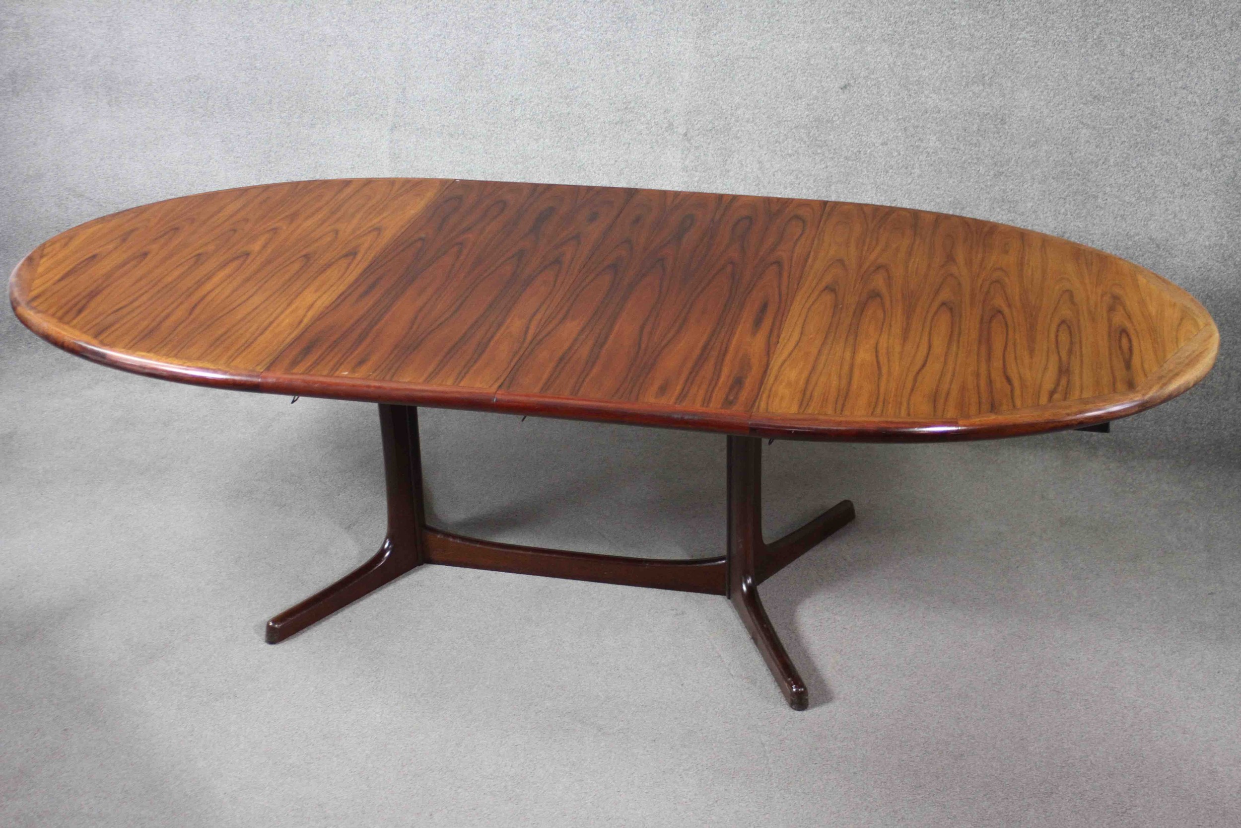 A vintage Danish dining table by Dyrland with two extra leaves and maker's label to the underside. - Image 5 of 7