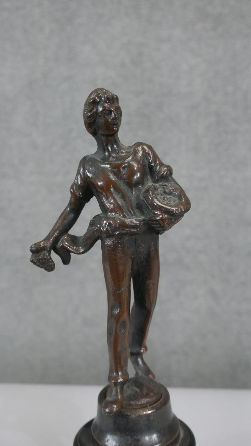 A bronze figure of a farm boy feeding chickens mounted on an ebonised base. Plaque reads Semeur. H. - Image 2 of 4