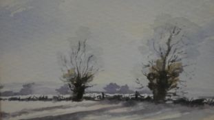A framed and glazed watercolour on paper of a snowy landscape. Indistinctly signed. H.34 W.34cm