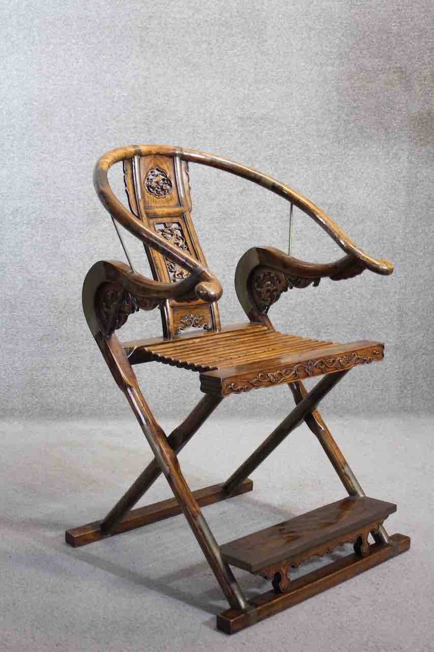 A Chinese huali folding scribes armchair with hooped back and intricately carved back splat and - Image 2 of 10