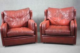 A pair of vintage armchairs in geometric stitched burgundy upholstery. H.85 W.85 D.95 cm