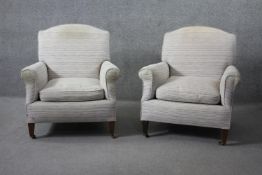 A pair of C.1900 armchairs in piped velour upholstery on mahogany square tapering supports