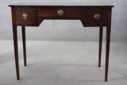 A 19th century mahogany three drawer kneehole writing table. H.80 W.100 D.50 cm.