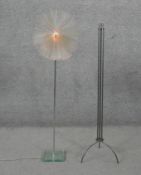 A large abstract wrought iron floor standing tripod candlestick along with a vintage fibre optic