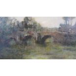 A framed oil on board of a bridge over a river. Unsigned. H.33 W.43cm