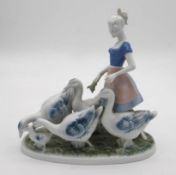 A vintage Gerold Porzellan Figure #7048 - Shepherdess Herding Geese. Makers stamp to the base. H.