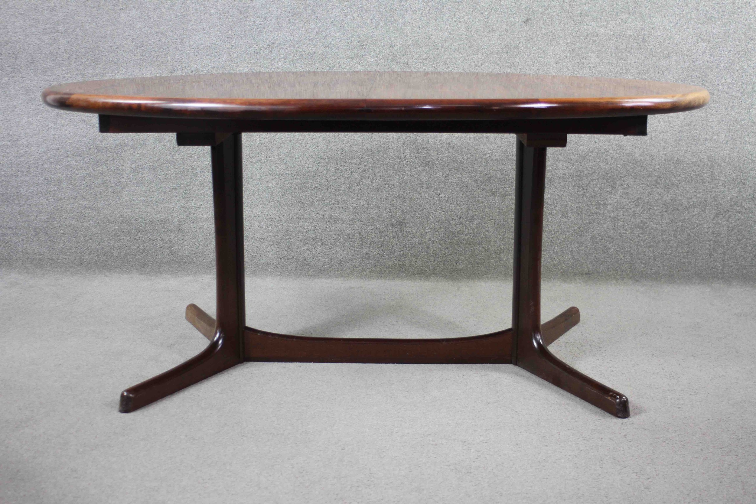 A vintage Danish dining table by Dyrland with two extra leaves and maker's label to the underside. - Image 2 of 7